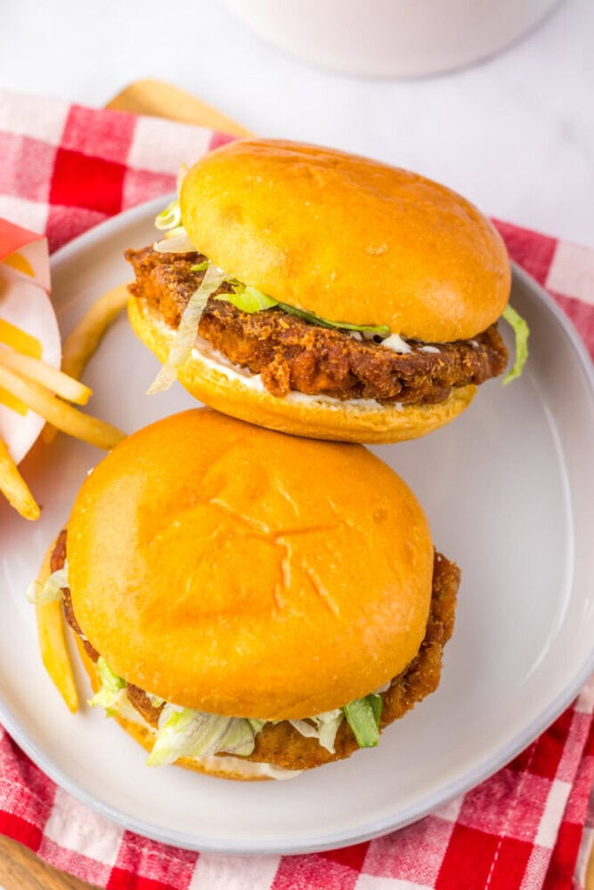 Delicious crispy fried chicken sandwiches with fresh lettuce and soft buns. Perfect for a quick, fla.