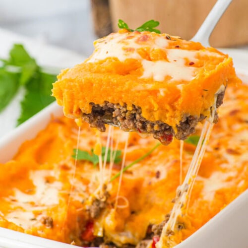 Delicious shepherd's pie with ground beef, mashed potatoes, and melted cheese.