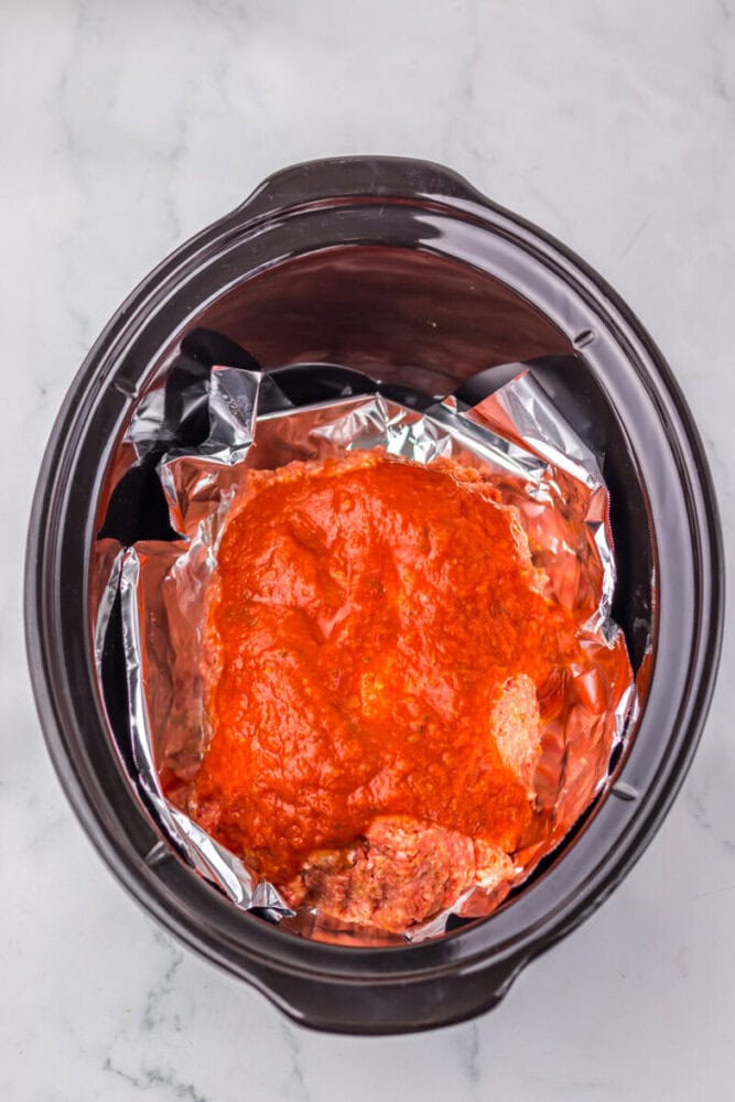 Juicy, tender BBQ ribs cooked in a slow cooker with rich sauce.