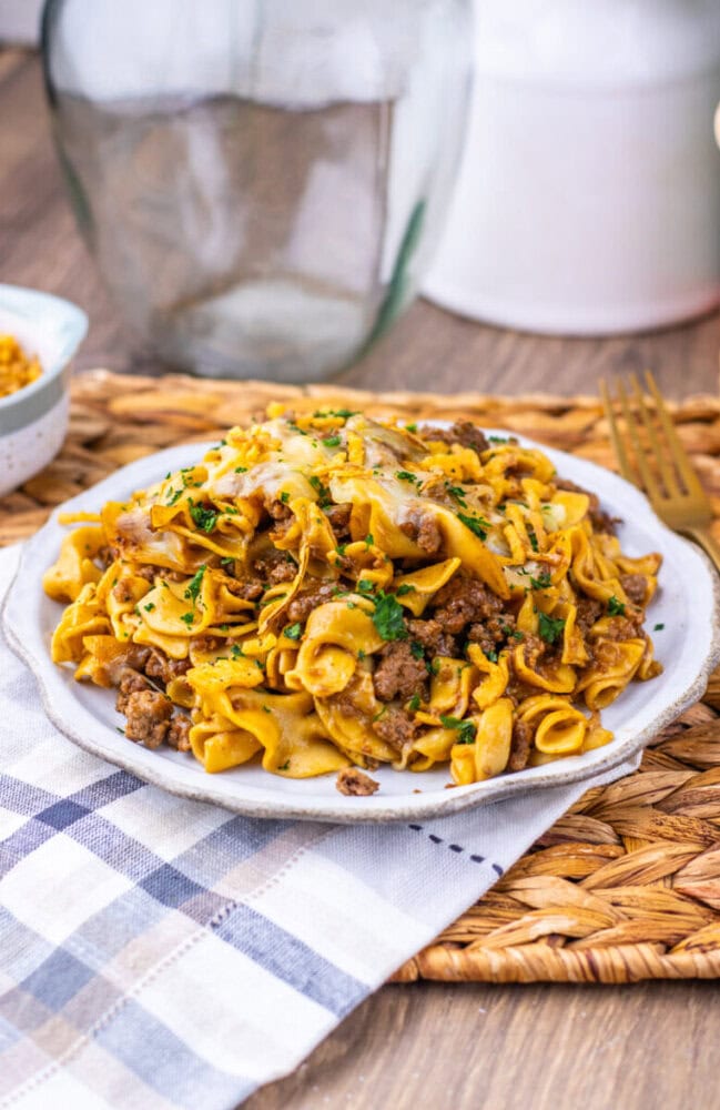 Delicious beef and mushroom pasta with rich sauce, topped with cheese and herbs. Perfect for a comfo.