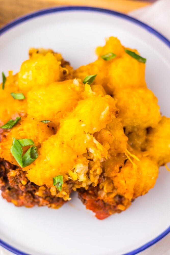 Warm chocolate chip cookies on a baking sheet, ready to enjoy.