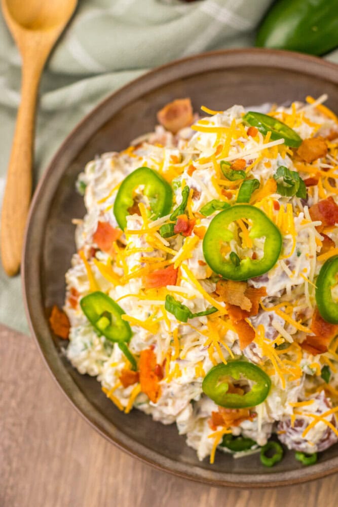 Creamy chicken salad topped with jalapeños, shredded cheese, and bacon bits.