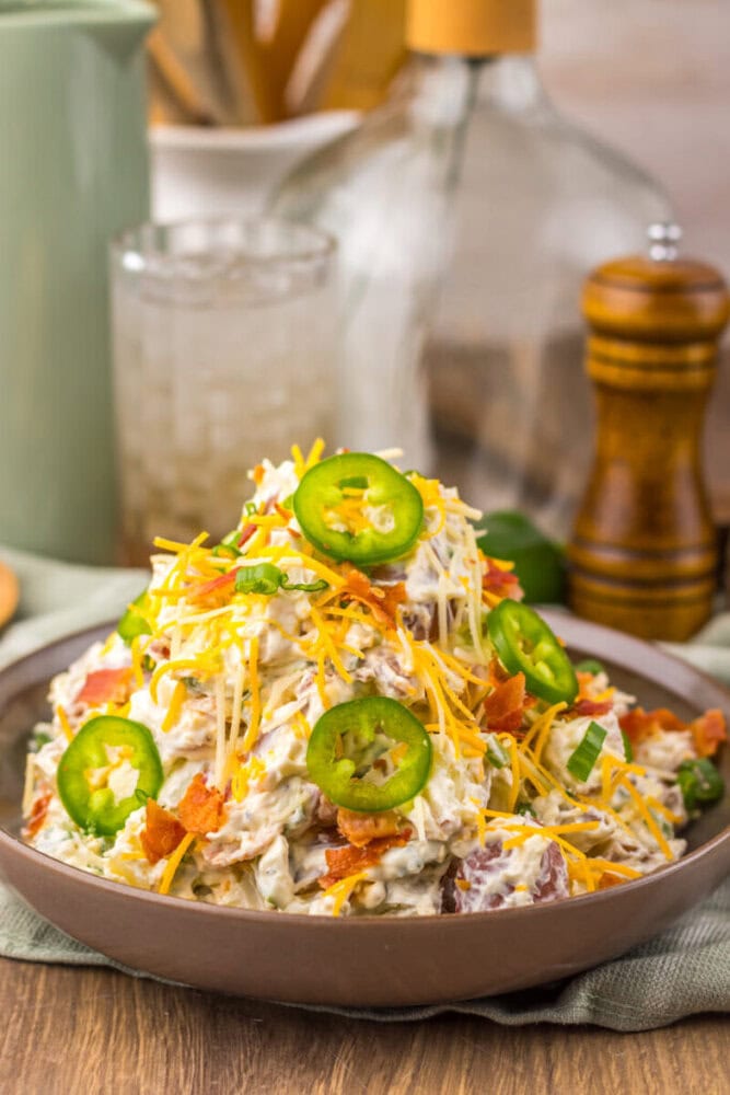 Delicious chicken salad topped with jalapeños and shredded cheese.