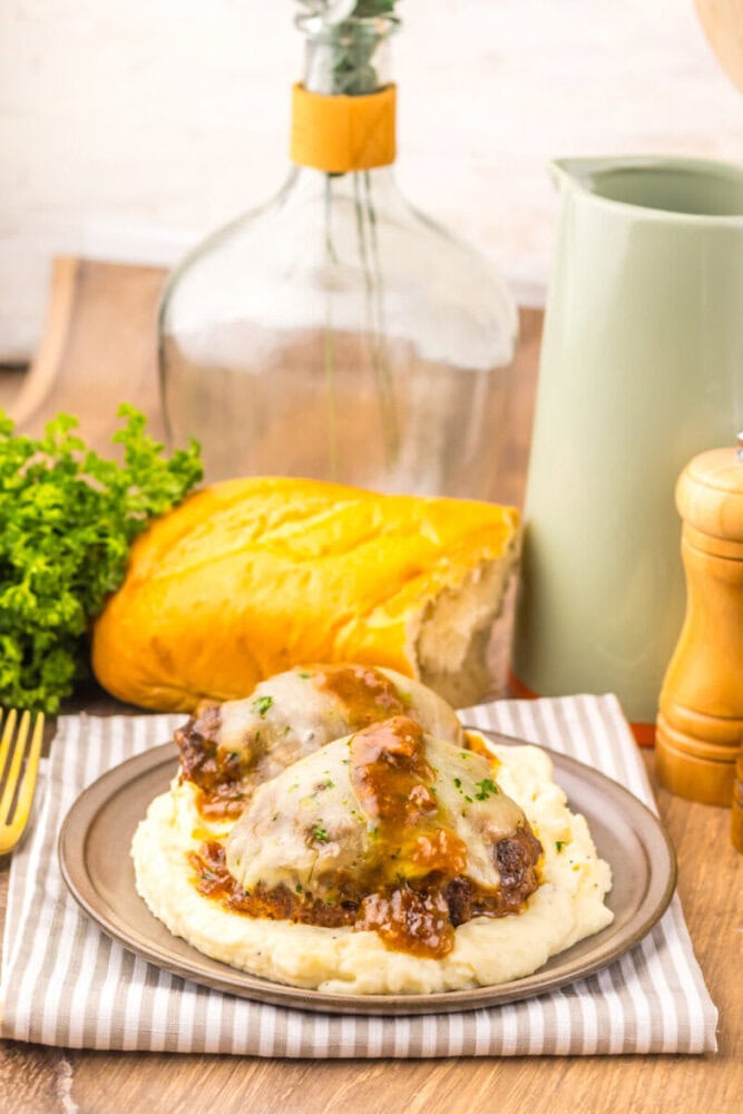 Delicious shepherd's pie with seasoned ground beef and melted cheese on mashed potatoes.