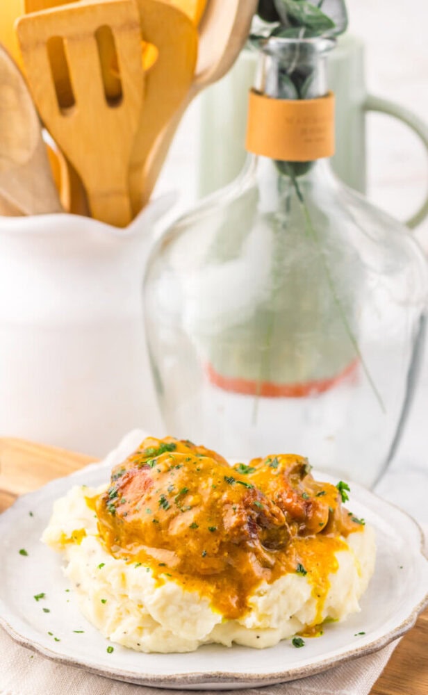 Delicious chicken smothered in gravy served over creamy mashed potatoes.