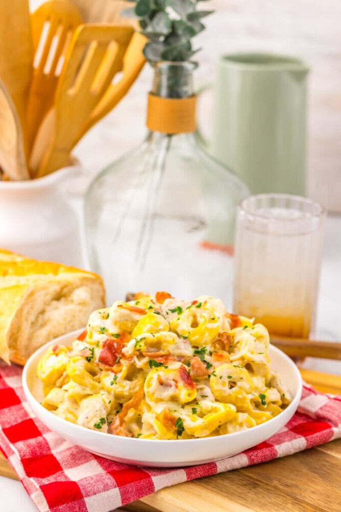Delicious creamy chicken pasta salad with vegetables and herbs.