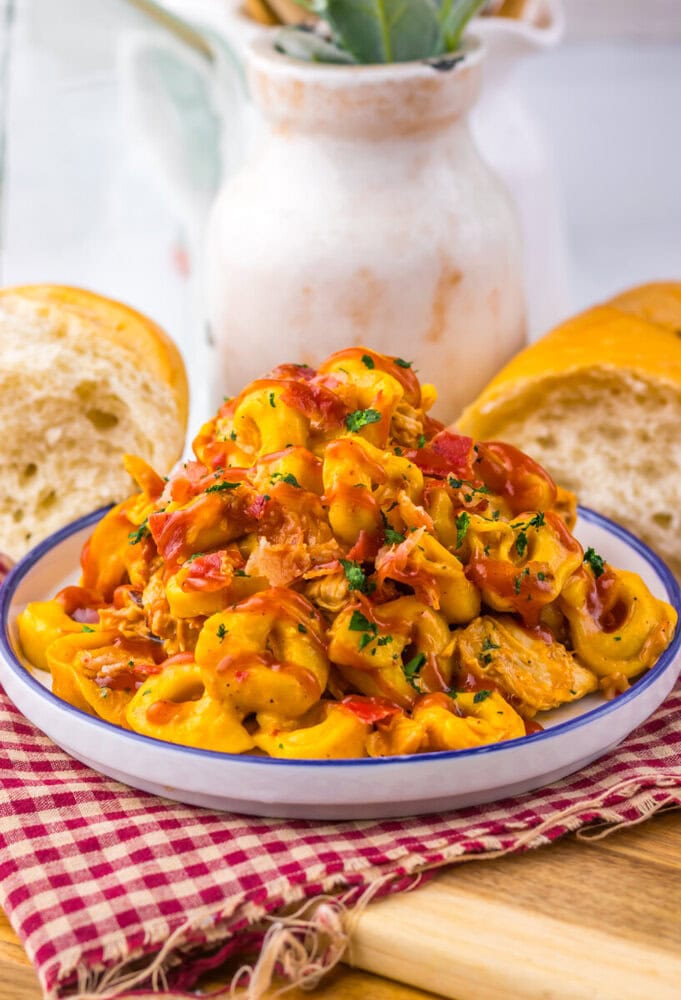 Creamy chicken pasta with vegetables and cheese in a flavorful sauce. Perfect comfort food for famil.