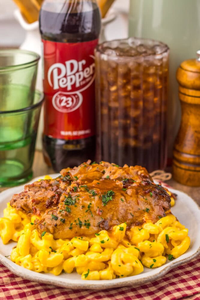 Delicious cheeseburger mac and cheese served with a cold Dr. Pepper soda. Perfect comfort food for a.