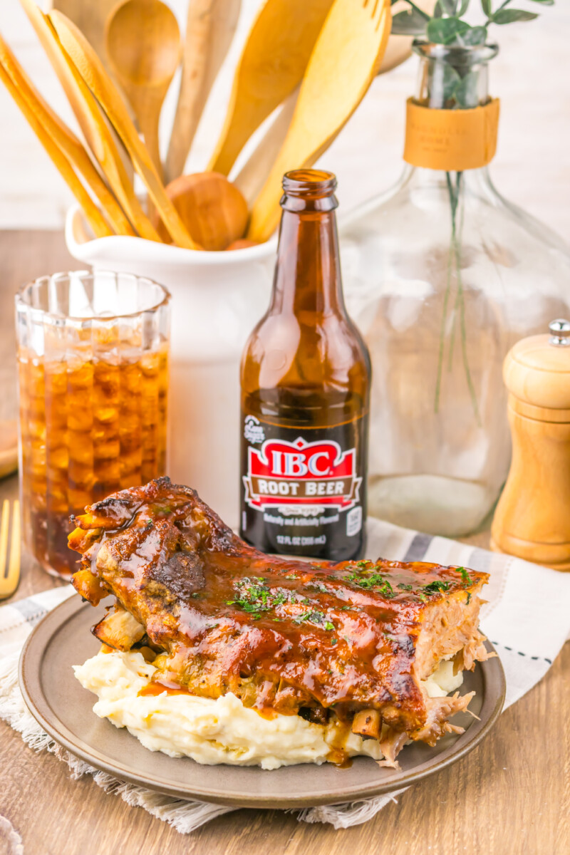Delicious BBQ ribs served with creamy mashed potatoes, perfect for a comforting meal. Ideal for fami.