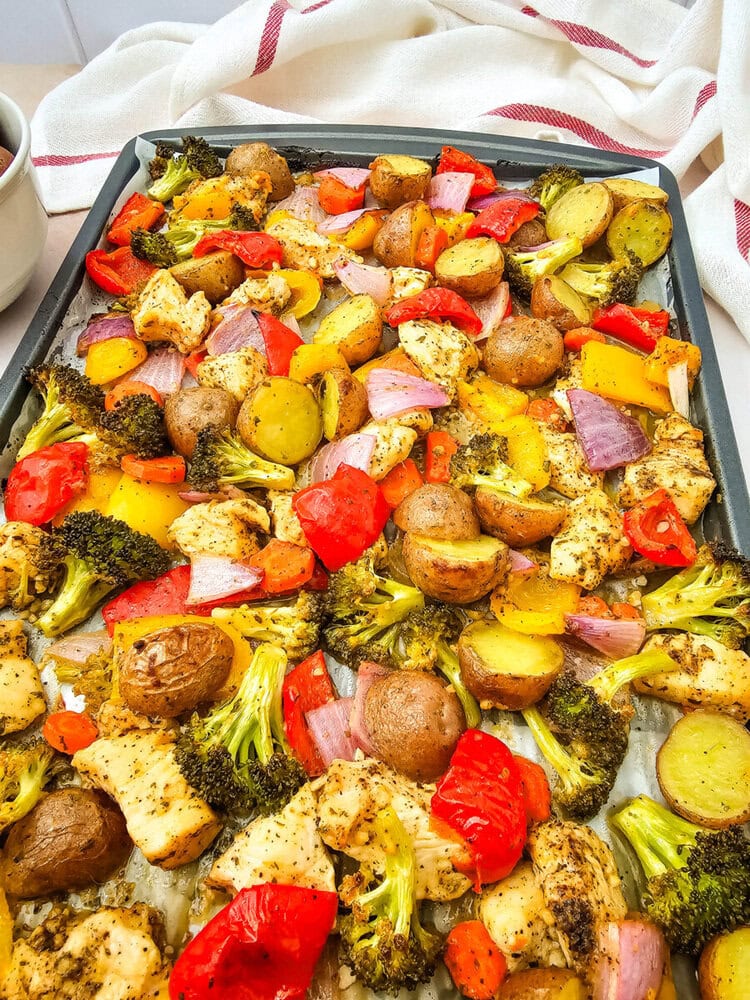 Sheet pan sriracha ranch chicken with roasted broccoli, peppers, potatoes and ham