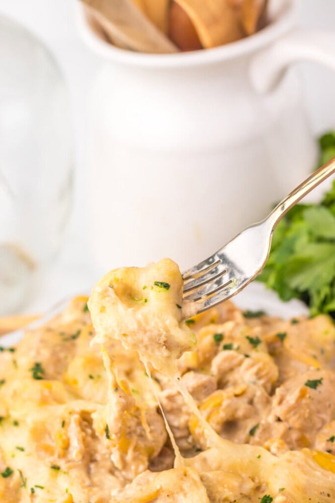 Delicious creamy chicken casserole with melted cheese and herbs.