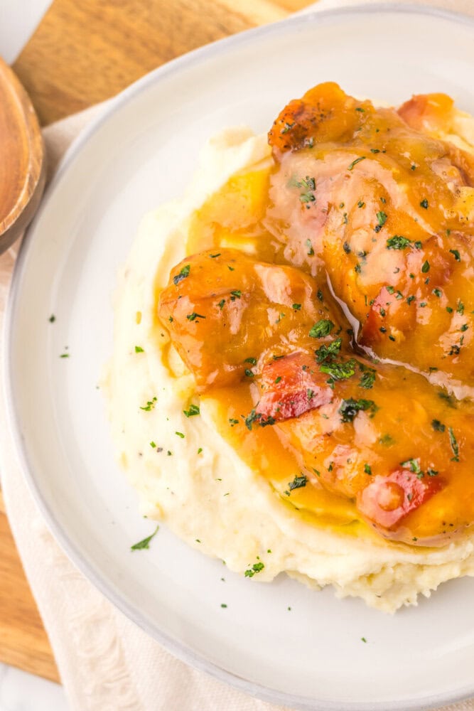 Creamy chicken topped with gravy served over mashed potatoes.